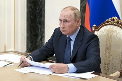 Russian President Vladimir Putin attends a Cabinet meeting in Moscow on July 25, 2022.