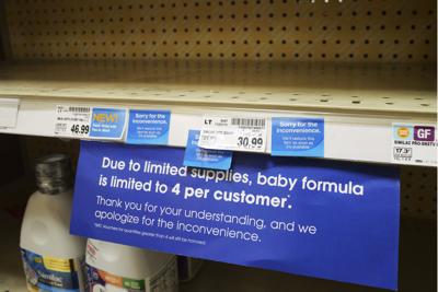 A due to limited supplies sign is shown on the baby formula shelf at a grocery store Tuesday, May 10, 2022, in Salt Lake City.