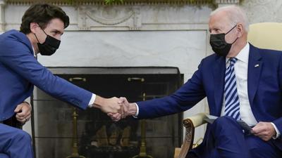 The connection President Joe Biden, right, has with Canada Prime Minister Justin Trudeau has eased strain at the top following four tumultuous years in the relationship under the Trump administration.