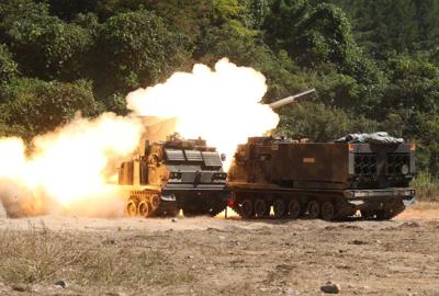 An M270 multiple launch rocket system fires during a live fire training exercise at Rocket Valley, South Korea, Sep. 25, 2017. 2nd Battalion, 4th Field Artillery Regiment , 210th Field Artillery Brigade, 2nd Infantry Division ROK-US Combined Division, c...