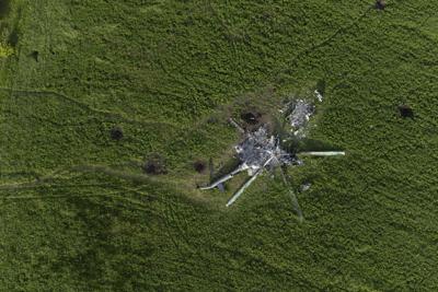 The remains of a destroyed Russian helicopter lie in a field in Malaya Rohan, Ukraine, on May 16, 2022.