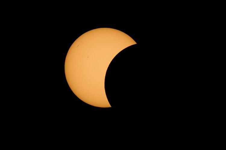 Rare solar eclipse is a dramatic celestial spectacle for millions across Europe, in photos