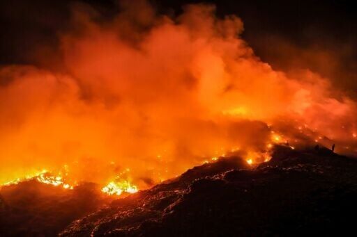 A fire burning at a landfill site in Rasau Jaya, Kubu Raya, West Kalimantan