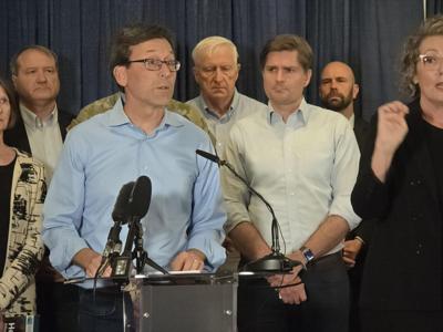 Washington governor at a press conference regarding wildfires in central and eastern parts of the state