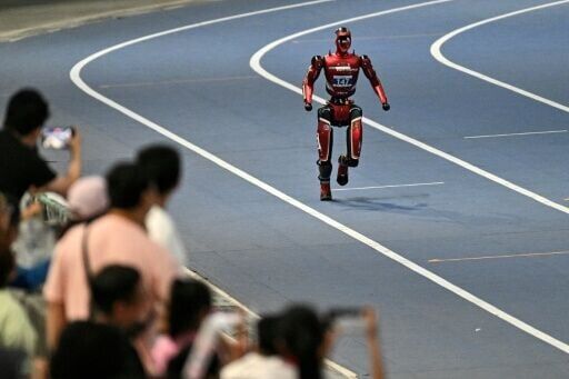 A humanoid robot competes on the first day of the 2nd World Humanoid Robot Games in Beijing on August 22, 2026