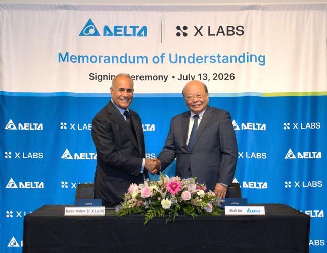 Mark Ko, Vice Chairman of Delta Electronics, Inc., and Karan Trehan, CEO and Founder of X LABS, shake hands at the MOU signing ceremony held at Delta's Fremont, California headquarters on July 13, 2026.