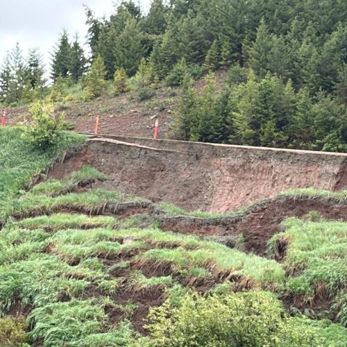 Evans Riceville Road near Belt down to one lane after slide1