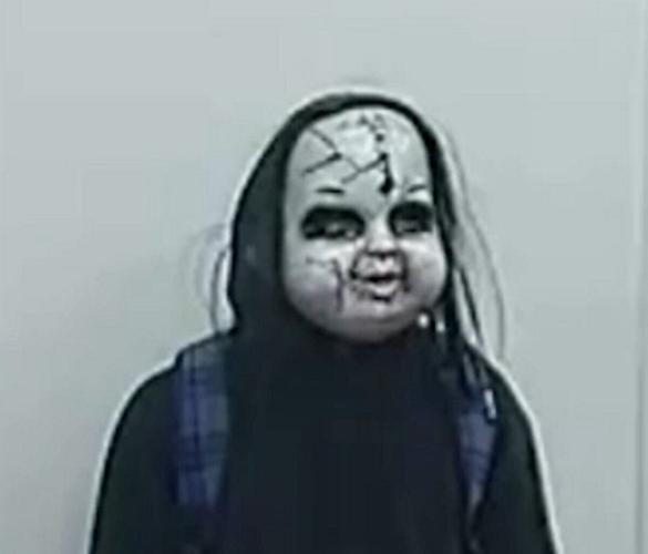 Watch moment man in Chucky mask chases woman