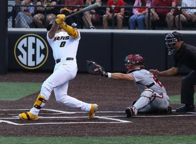 Mateo Serna (8) swings at the ball (copy)