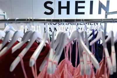 (FILES) This photograph shows the logo of the Asian e-commerce giant Shein displayed at the Bazar de l'Hotel de Ville (BHV) department store in Paris on March 19, 2026. A French appeals court on March 19, 2026 rejected the government's demand to tempora...