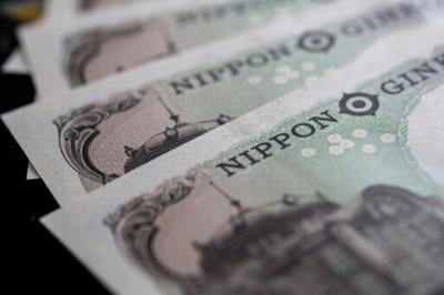 The yen rose against the dollar after data showed Japanese inflation picked up last month
