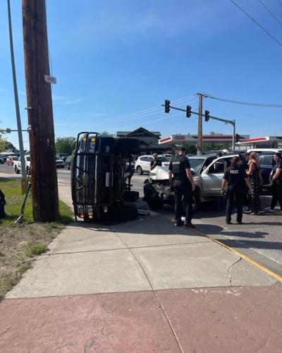 Multi-agency response after rollover crash hits power pole in Missoula