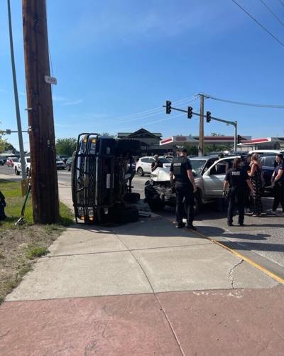 Multi-agency response after rollover crash hits power pole in Missoula