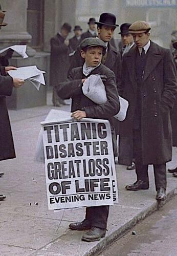A paperboy sells newspapers announcing the demise of the RMS Titanic.
